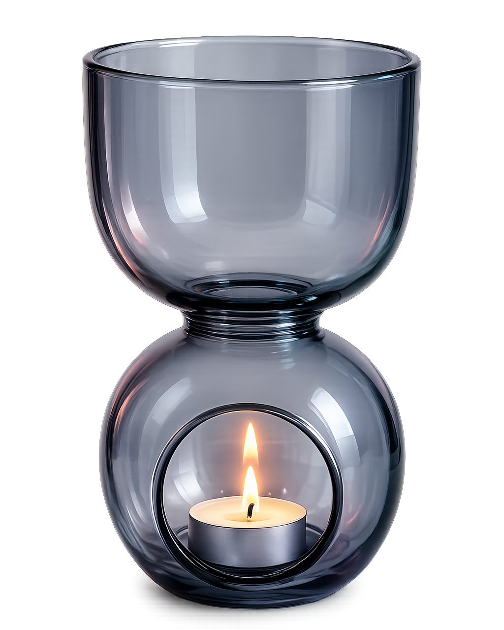 Smoky gray glass candle holder with a lit candle inside on a white background